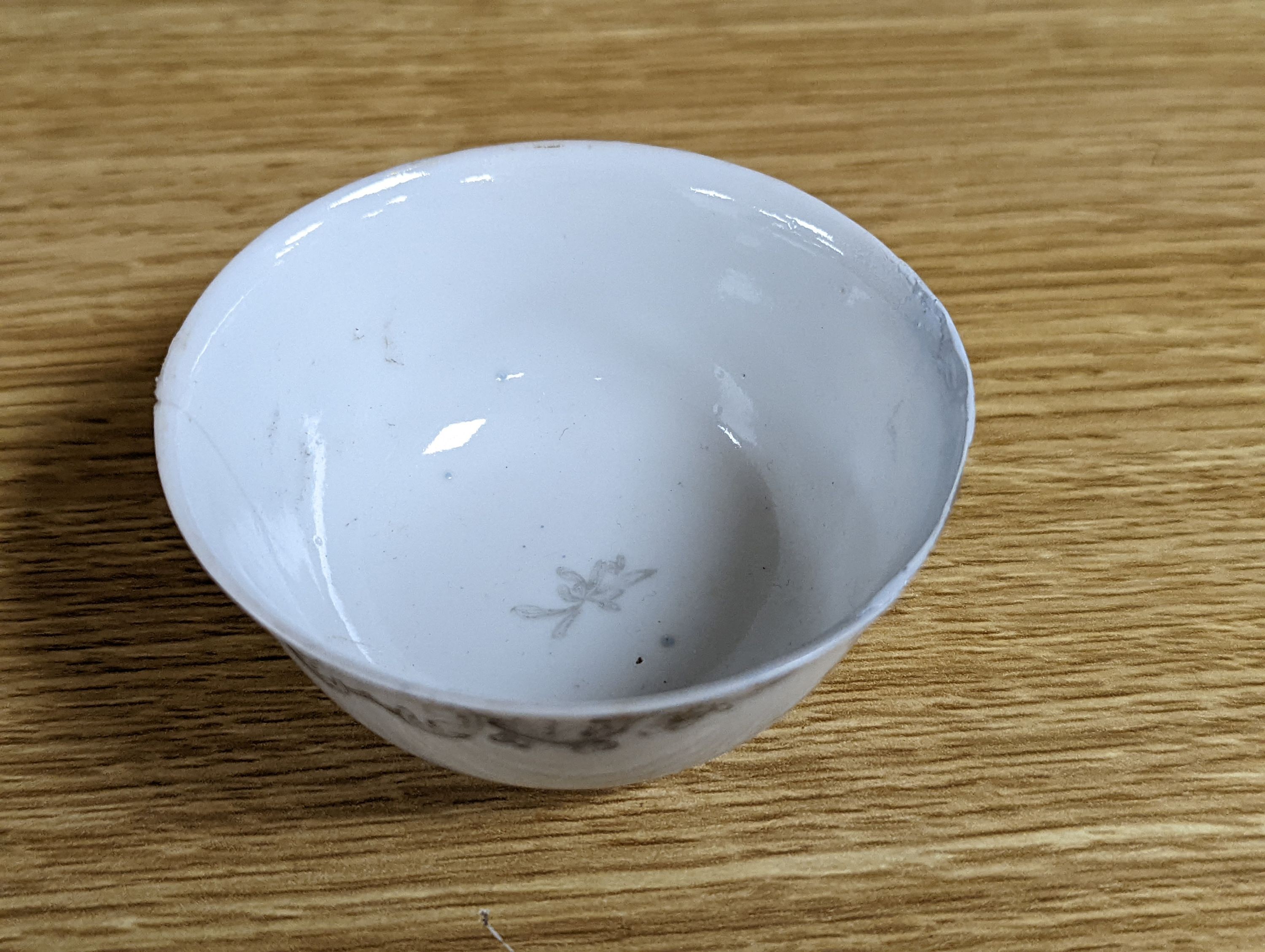 Two 18th century Chinese export bowls, a similar tea bowl and another Chinese blue and white tea bowl, largest 20cm diameter